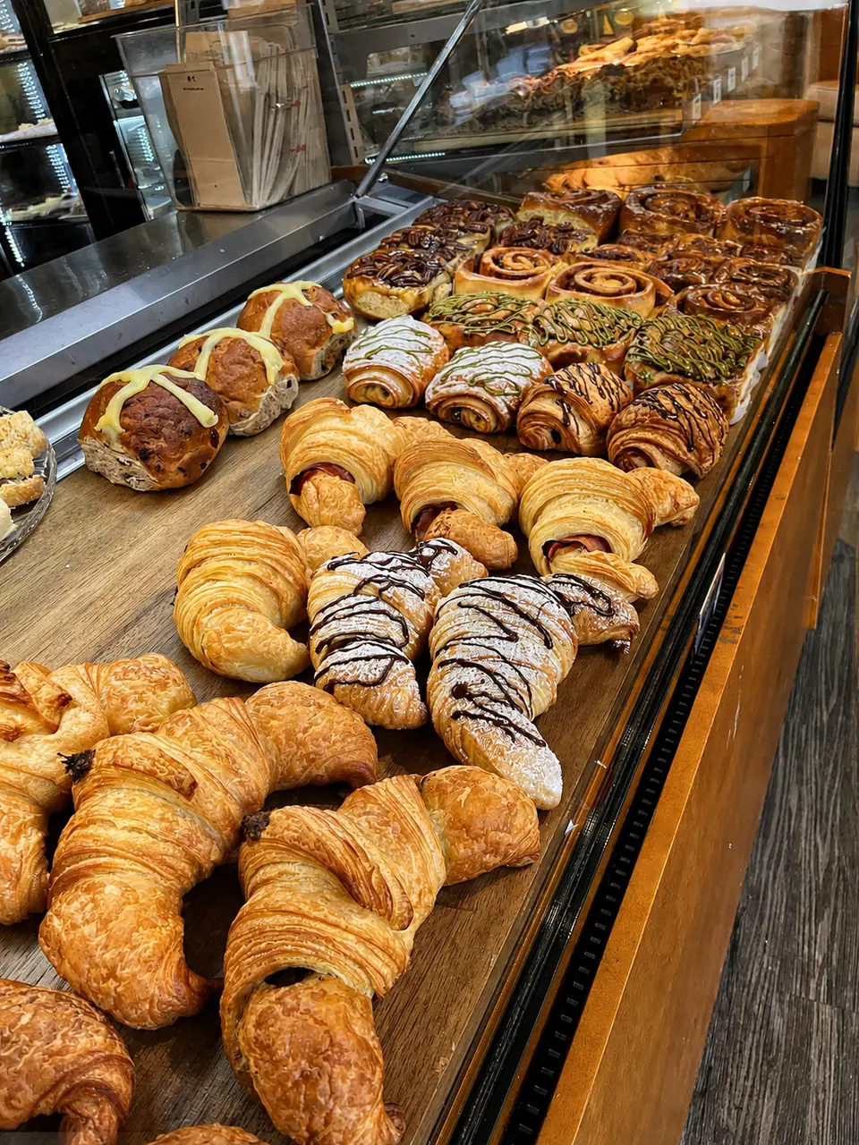 Croissants and pastries in the bakery display